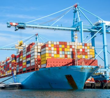 arge-container-ship-in-port-on-a-clear-summer-day